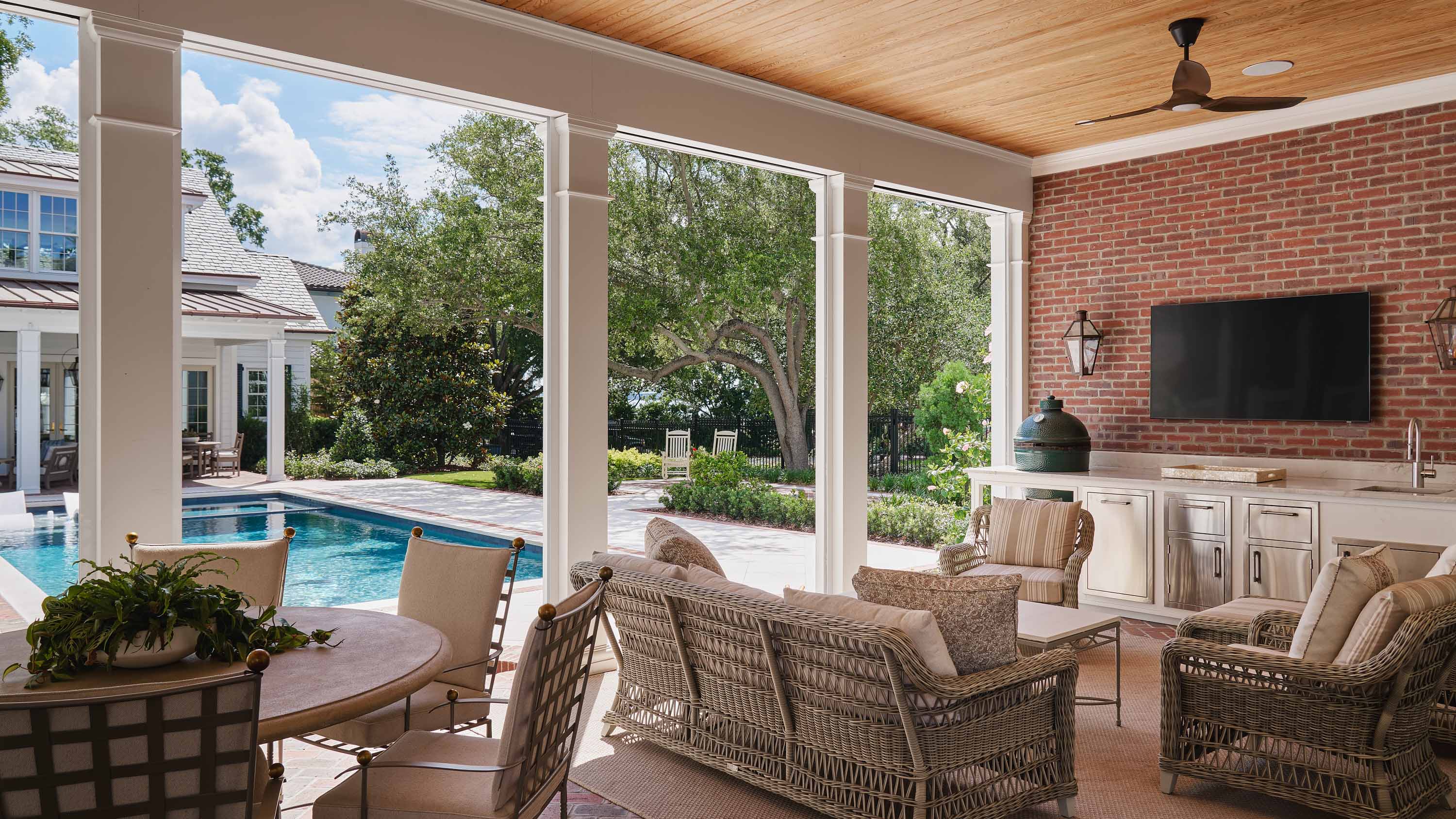 outdoor space with a pool and TV